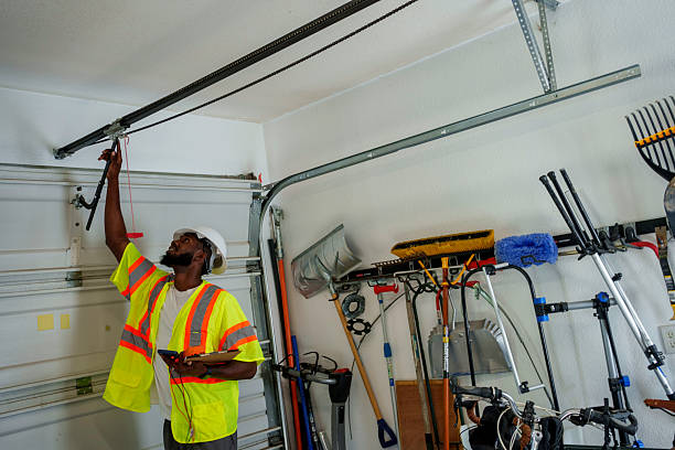 Professional Garage Door Panel Replacement technician working in Roanoke, IL